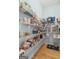 Organized pantry with ample shelving, providing plenty of storage space for food and supplies at 189 Willowleaf Way, Sharpsburg, GA 30277
