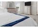Bright bedroom features a stylish bed, dresser, and a window with natural light at 150 Ivy Chase Loop, Dallas, GA 30157