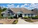 Community clubhouse featuring a stone entryway and well-maintained landscaping at 150 Ivy Chase Loop, Dallas, GA 30157