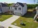Charming two-story home with well-maintained lawn, showcasing curb appeal and modern design at 150 Ivy Chase Loop, Dallas, GA 30157