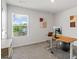 Bright Home Office with a window, desk, and a comfortable place to work at 150 Ivy Chase Loop, Dallas, GA 30157