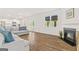 Open living area features a fireplace, and is open to the kitchen and the patio at 150 Ivy Chase Loop, Dallas, GA 30157