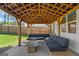 Outdoor patio featuring a seating area, fire pit, and view of the fenced backyard at 150 Ivy Chase Loop, Dallas, GA 30157