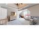 Bedroom featuring trey ceiling, toys, pink trampoline, and access to the attic and storage area at 30 Saint Charles Pl, Sharpsburg, GA 30277