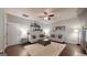 Bright living room features neutral furniture, a decorative rug, and shelving details at 30 Saint Charles Pl, Sharpsburg, GA 30277