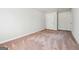 Bright bedroom with neutral carpet and a closet, providing a comfortable and private retreat at 4448 Janice Dr, Snellville, GA 30039