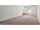 Bright room featuring plush carpeting and a closet, offering a comfortable and private retreat at 4448 Janice Dr, Snellville, GA 30039