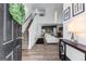 Inviting foyer with wood-look flooring that leads to a living area with an open-concept floor plan at 65 Hill Top Cir, Grantville, GA 30220