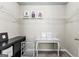 Bright walk-in closet with adjustable shelving, decor, and ample storage space at 65 Hill Top Cir, Grantville, GA 30220