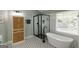 Well-lit bathroom featuring black framed glass shower and contemporary soaker tub at 1212 Dayspring Trce, Lawrenceville, GA 30045