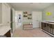 Bright Bedroom with a white changing table, charming decor, and ample closet space at 1212 Dayspring Trce, Lawrenceville, GA 30045
