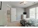 Cozy bedroom featuring large window and light gray walls at 1212 Dayspring Trce, Lawrenceville, GA 30045