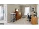 Comfortable bedroom offering closet storage and natural light from the window at 1212 Dayspring Trce, Lawrenceville, GA 30045