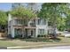 Charming two-story home with stone accents, a welcoming front porch and well-maintained landscaping at 1212 Dayspring Trce, Lawrenceville, GA 30045