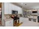 Spacious eat-in kitchen features stainless steel appliances and ample counter space at 1212 Dayspring Trce, Lawrenceville, GA 30045