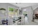 Bright dining area with large windows providing a view of the outdoor space at 100 Ashland Trl, Tyrone, GA 30290