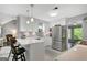 Stylish kitchen with island seating, stainless appliances, and ample counter space at 100 Ashland Trl, Tyrone, GA 30290