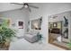 Cozy sunroom features bright interior and view into adjacent living room at 100 Ashland Trl, Tyrone, GA 30290