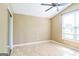 Bedroom with light walls, wood floors, ceiling fan, and a window with blinds to let natural light in at 110 Tamarack Trl, Mcdonough, GA 30252