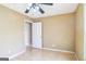 Neutral bedroom with wood floors, standard ceiling fan, and natural light at 110 Tamarack Trl, Mcdonough, GA 30252