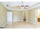 Large main bedroom with tray ceilings featuring ensuite bathroom and large walk-in closet at 110 Tamarack Trl, Mcdonough, GA 30252