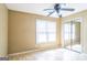 Cozy bedroom with hardwood floors, closet with mirrored sliding doors, and bright window at 110 Tamarack Trl, Mcdonough, GA 30252