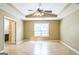 Inviting bedroom boasts wood floors, tray ceiling, and an ensuite bathroom; plenty of natural light at 110 Tamarack Trl, Mcdonough, GA 30252