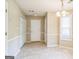 A cozy dining area with tile floors and natural light from a window at 110 Tamarack Trl, Mcdonough, GA 30252