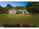 Charming single story home with a manicured front lawn and traditional architectural details at 110 Tamarack Trl, Mcdonough, GA 30252