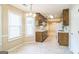 Bright and airy kitchen with ample natural light and traditional cabinetry at 110 Tamarack Trl, Mcdonough, GA 30252