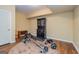 Basement workout area featuring laminate floors and exercise equipment at 325 Elderberry Trl, Fayetteville, GA 30214