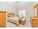 Comfortable bedroom with neutral walls, a ceiling fan, and plenty of natural light at 325 Elderberry Trl, Fayetteville, GA 30214