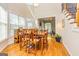 Sunny dining room with hardwood floors and lots of natural light at 325 Elderberry Trl, Fayetteville, GA 30214