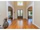Grand foyer with hardwood floors, high ceilings, and a view of the living spaces at 325 Elderberry Trl, Fayetteville, GA 30214