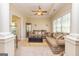 Cozy living room with neutral colors, lots of light, and a comfortable sofa at 325 Elderberry Trl, Fayetteville, GA 30214