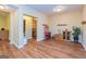 This living area features hardwood floors and a glimpse of a connected bathroom at 325 Elderberry Trl, Fayetteville, GA 30214