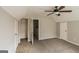 This bedroom offers a closet and a ceiling fan at 6024 S Deshon Ct, Lithonia, GA 30058