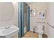 Clean bathroom with a sink, toilet, and shower curtain at 284 Villa Grande Dr, Locust Grove, GA 30248
