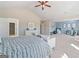 An open, light filled bedroom with access to a home office or gym at 284 Villa Grande Dr, Locust Grove, GA 30248