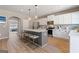 Spacious kitchen with a center island and stainless steel appliances at 284 Villa Grande Dr, Locust Grove, GA 30248