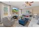 Comfortable living room includes a fireplace with a large screen TV at 284 Villa Grande Dr, Locust Grove, GA 30248
