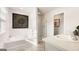Bright bathroom features a soaking tub and separate shower at 12040 Conrad Cir, Hampton, GA 30228