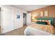 Bedroom featuring a brightly decorated bed and a walk-in closet at 12040 Conrad Cir, Hampton, GA 30228