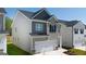 Well-maintained two-story home with a two-car garage and a manicured lawn at 12040 Conrad Cir, Hampton, GA 30228
