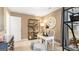 Study featuring a large clock and dark brown walls at 12040 Conrad Cir, Hampton, GA 30228