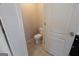 Half-bath with a toilet at 3526 Brockenhurst Dr, Buford, GA 30519
