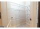 Walk-in pantry features metal shelving for ample storage space at 3526 Brockenhurst Dr, Buford, GA 30519