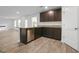 Stylish kitchen featuring a breakfast bar and stainless steel appliances at 1144 Bluecoat Cir, Hampton, GA 30228