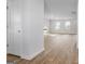 Bright living room with wood-look flooring and a cozy ambiance at 1144 Bluecoat Cir, Hampton, GA 30228