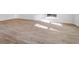 Spacious room featuring wood-look flooring and natural light at 1144 Bluecoat Cir, Hampton, GA 30228